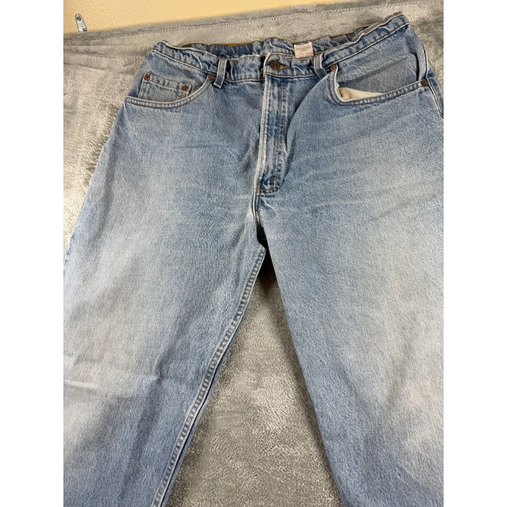 Vtg Levi's 560 Jeans USA Made 38x32 Loose Tapered Light Wash Distressed